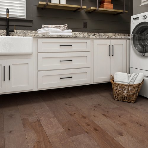 Laundry room with engineered hardwood flooring from Carpet City & Flooring Center in the Fairfield, CT area