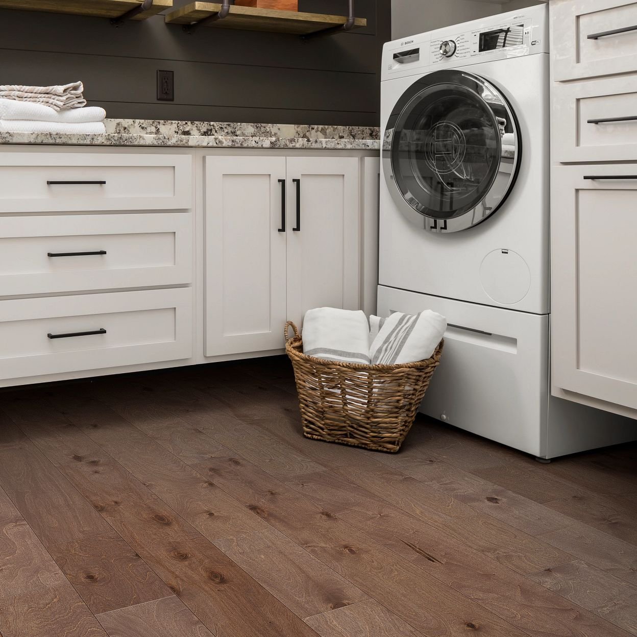 Laundry room with engineered hardwood flooring from Carpet City & Flooring Center in the Fairfield, CT area