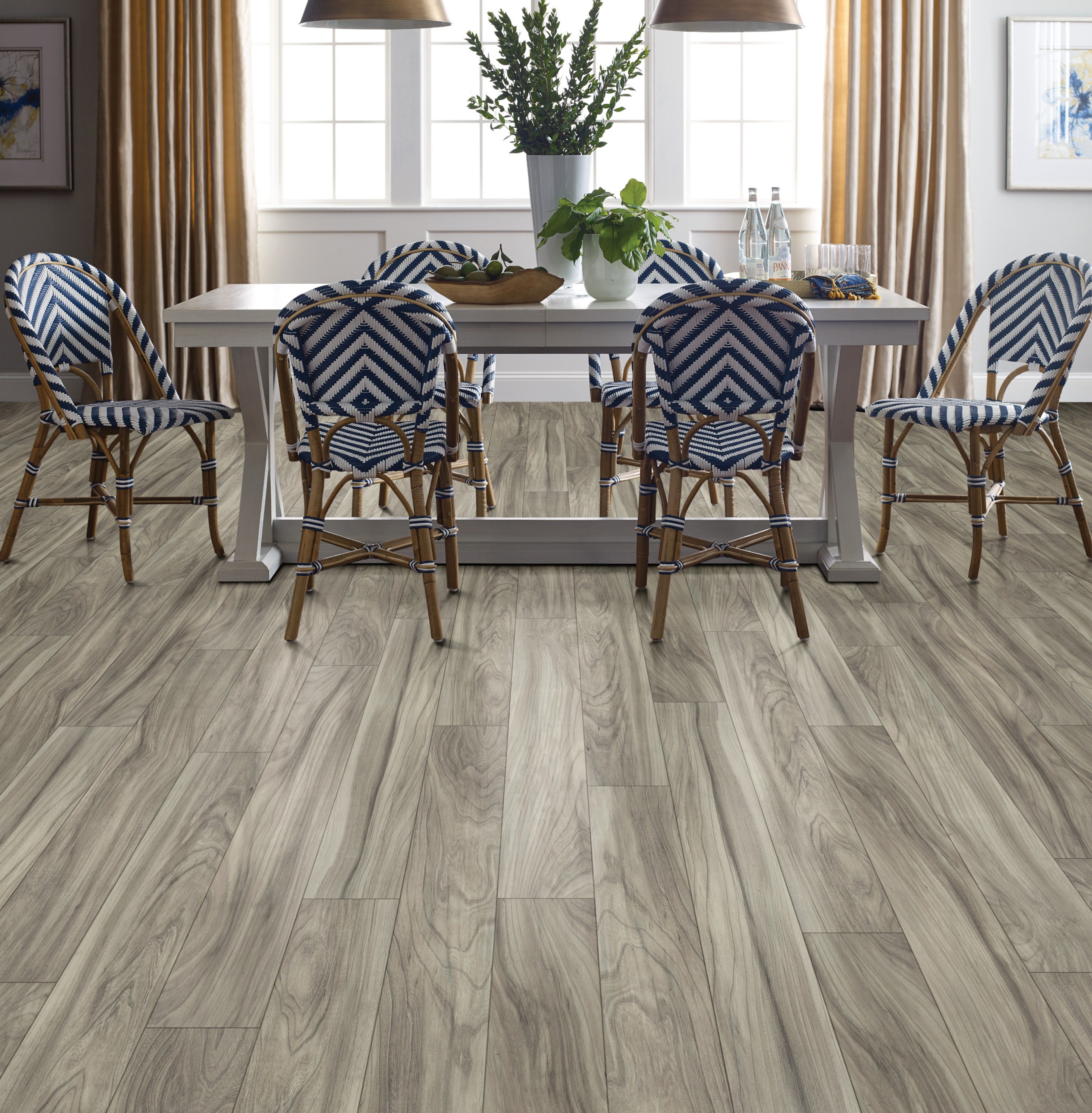 Dining room with wood-look laminate flooring from Carpet City & Flooring Center in the Fairfield, CT area