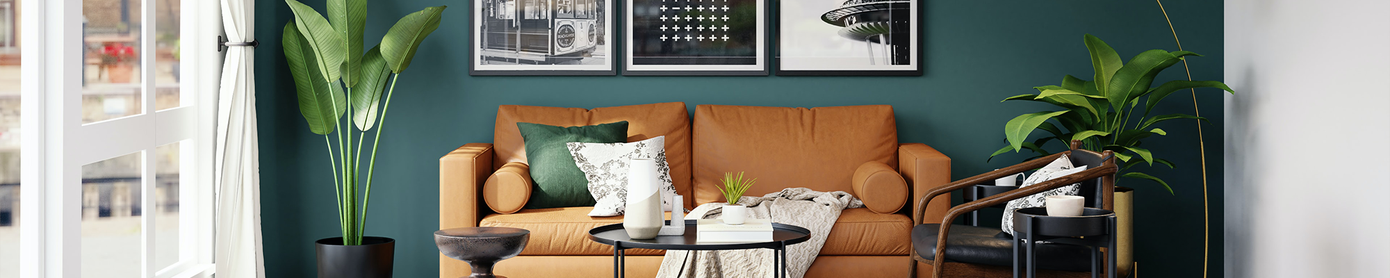 living room with orange couch and houseplants with pictures on the wall from Carpet City & Flooring Center in the Fairfield, CT area