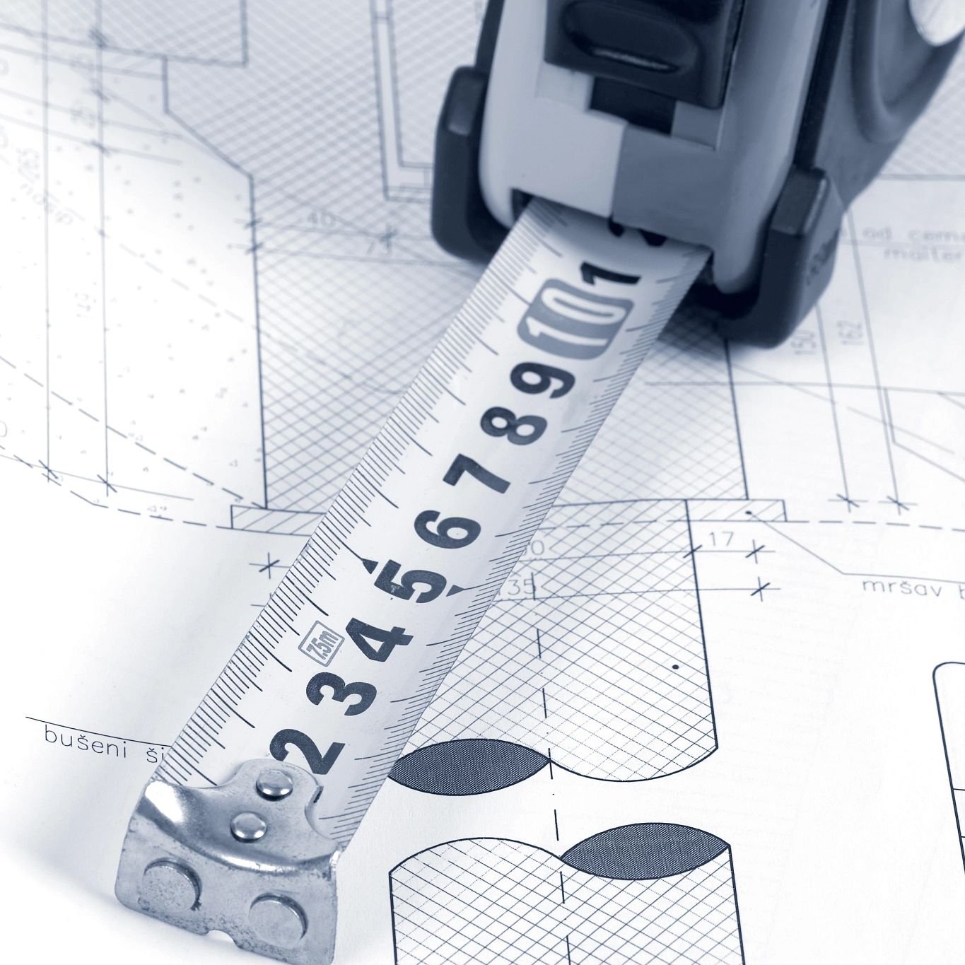 Tape measure on blueprints from Carpet City & Flooring Center in the Fairfield, CT area