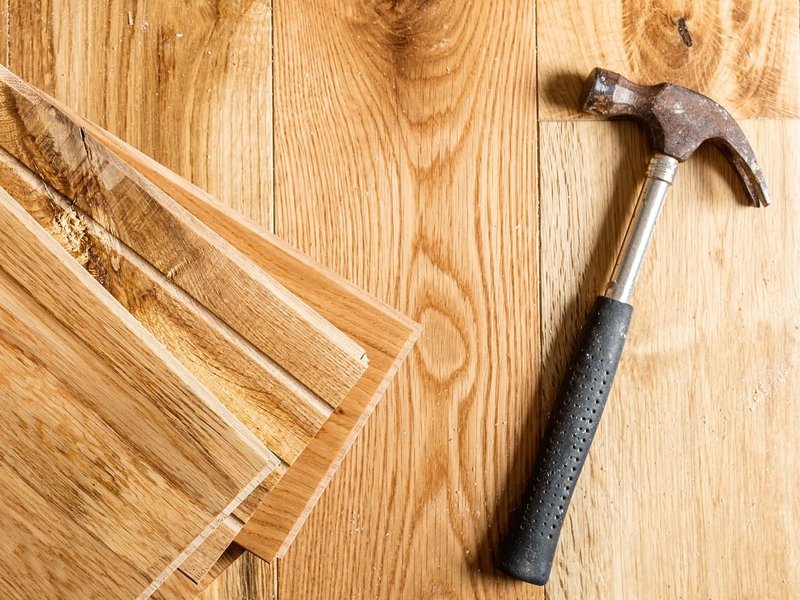 Hammer on hardwood floor - Hardwood flooring installation services from Carpet City & Flooring Center in the Fairfield, CT area